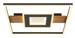 Pikara 38cm Puu plafondi valmistajalta Globo Lighting - Lampan &auml;r tillverkad i en stilfull kombination av metall i tr&auml;look och en mattsvart finish, vilket ger den en modern men samtidigt naturlig k&auml;nsla.