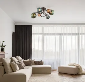 Riha Ø65 Monivärinen plafondi valmistajalta Globo Lighting - De olika glaskulorna i brons, gr&ouml;nt och petrol ger lampan en dynamisk och lekfull karakt&auml;r samtidigt som de skapar en visuellt intressant ljusbild.