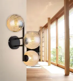 Conor 36cm Keltainen valmistajalta Globo Lighting - Conor v&auml;gglampa i mattsvart med amberf&auml;rgade glassf&auml;rer ger en modern och elegant touch till vilket rum som helst.