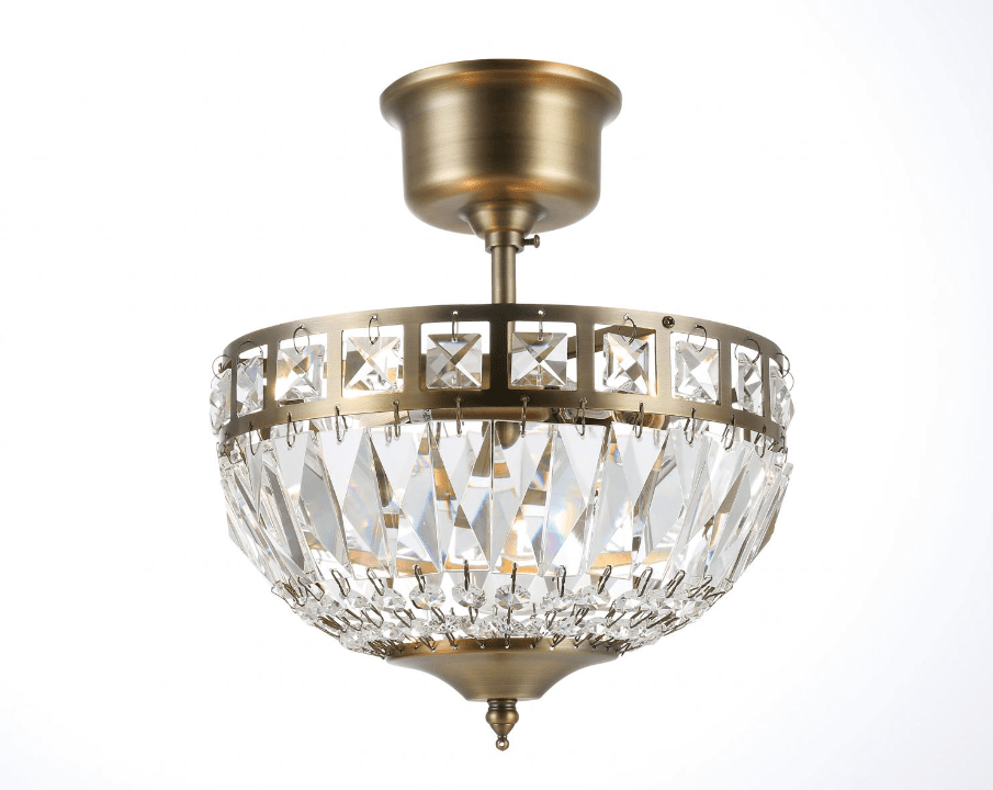 Flores Ø25 Antiikki messinki kristalli valmistajalta Norrsken Design - K&auml;sin leikatut Class 1 K9 -kiteet antavat upean kiillon ja luovat kauniin valon leikin, joka muuttaa mink&auml; tahansa huoneen kimaltelevaksi keitaaksi.