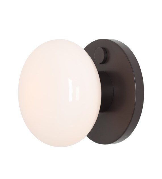 Flo Ø20 Tummanruskea seinävalaisin valmistajalta Artera - Siinä on moderni ja tyylikäs muotoilu, joka levittää pehmeää ja miellyttävää valoa.