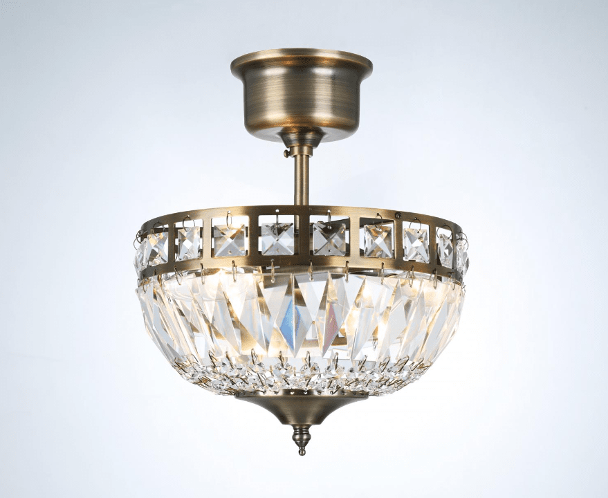 Flores Ø25 Antiikki messinki kristalli valmistajalta Norrsken Design - K&auml;sin leikatut Class 1 K9 -kiteet antavat upean kiillon ja luovat kauniin valon leikin, joka muuttaa mink&auml; tahansa huoneen kimaltelevaksi keitaaksi.