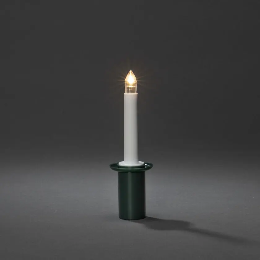 Tärnan Lucia-kynttilä Vihreä valmistajalta Konstsmide - Tyylikäs tornivalo vihreällä pidikkeellä ja LED-valolla, joka levittää pehmeää, lämmintä valkoista hehkua.