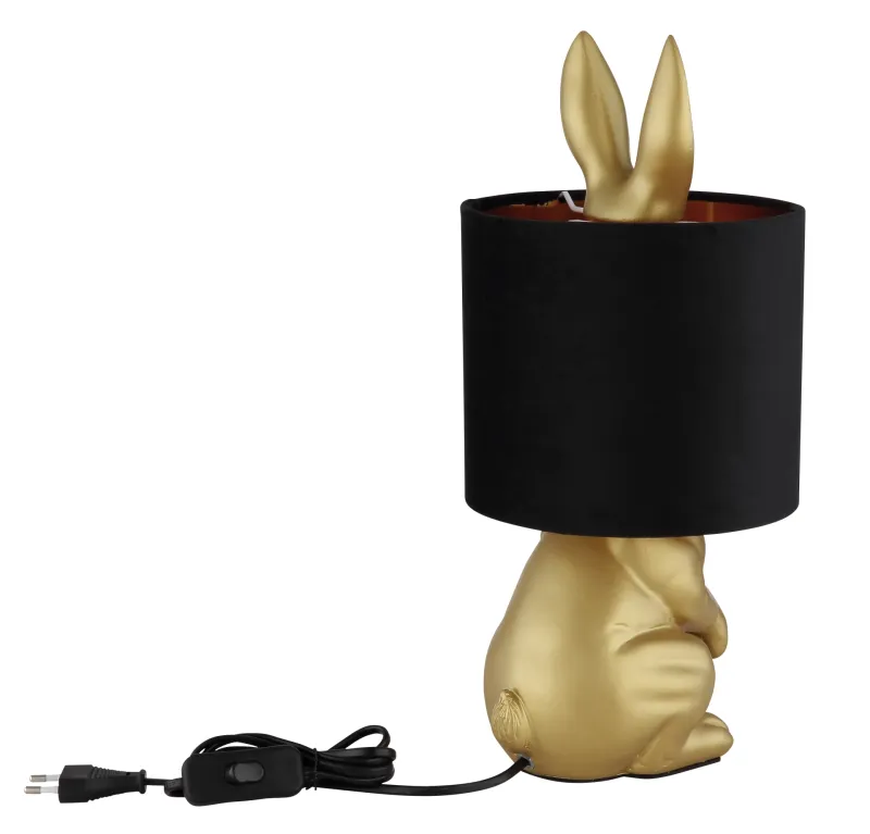 Rabbit 40cm Kulta pöytävalaisin valmistajalta Globo Lighting - Med en guldf&auml;rgad kaninfigur som bas och en elegant svart sammetsk&auml;rm kombinerar den lekfull design med sofistikerad stil.