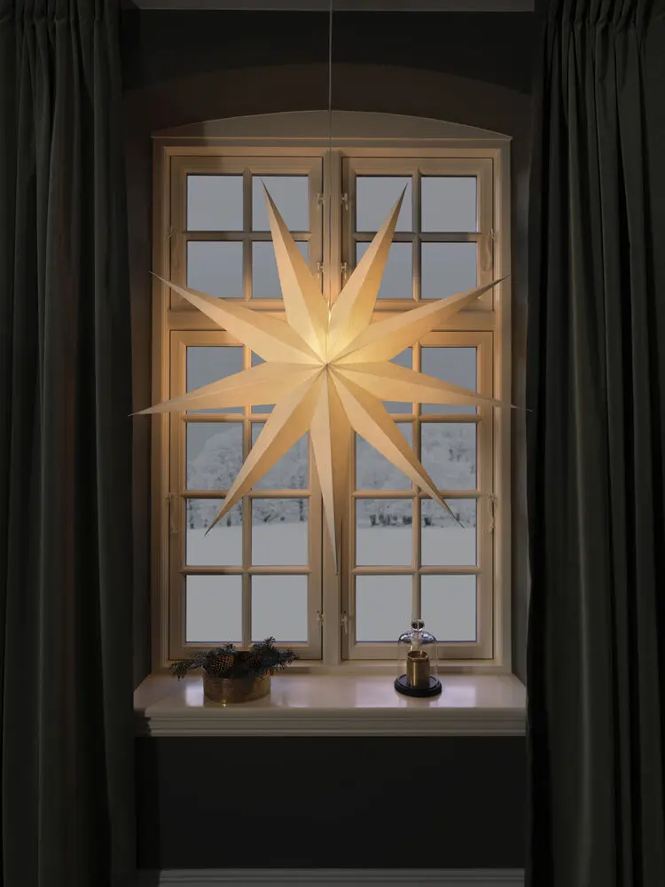 Paperitähti Ø115 Valkoinen valmistajalta Konstsmide - Tyylikk&auml;&auml;ll&auml; muotoilullaan ja pehme&auml;ll&auml; valollaan se levitt&auml;&auml; rauhallista ja kodikasta joulutunnelmaa.