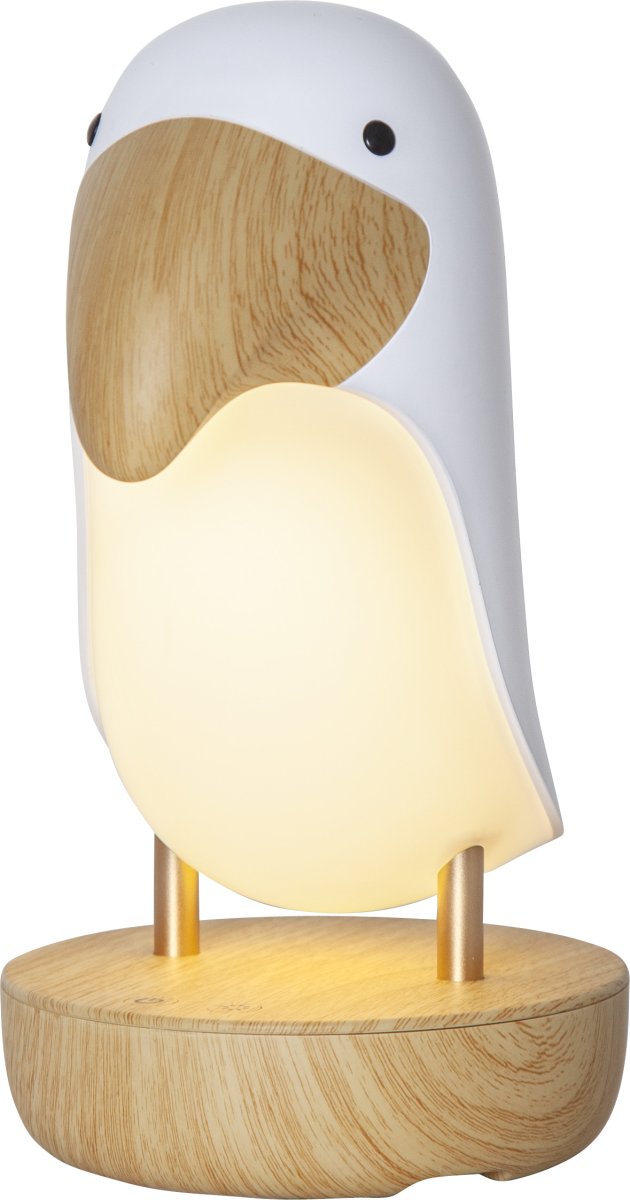 Toucan Bird Valkoinen lasten valaisin valmistajalta Star Trading - Toucan Bird on leikkisä ja koristeellinen lamppu, joka levittää pehmeää ja miellyttävää lämpimän valkoista valoa.
