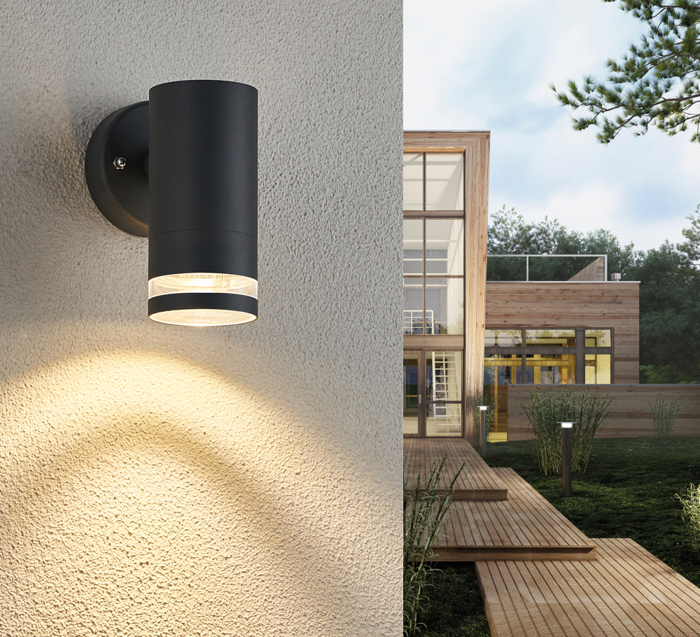 Cylinder Antrasiitti ulkovalo valmistajalta Lampan - Lampan lyser fint ner p&aring; v&auml;ggen och skapar en h&auml;rlig atmosf&auml;r.