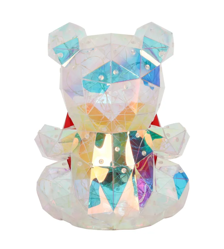 Brondar Läpinäkyvä lasten valaisin valmistajalta Globo Lighting - Den charmiga bordslampan i form av en s&ouml;t bj&ouml;rn med ett hj&auml;rta i kristall-look sprider ett magiskt sken i rummet.