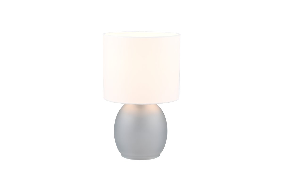 Vela 30cm Harmaa pöytävalaisin valmistajalta Trio Lighting - Hienostunut valkoisen ja harmaan väriyhdistelmä täydentää valaisimen suunnittelun ja luo nykyaikaisen tunnelman, joten se on ihanteellinen sisustusyksityiskohta kotiisi.