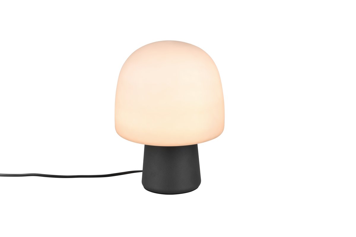 Steen 27cm Musta pöytävalaisin valmistajalta Trio Lighting - Sienen muotoinen siluetti sekä mattamustan pohjan ja taupe-värisen lasinäytön yhdistelmä tekevät siitä tyylikkään katseenvangitsijan joka huoneessa.
