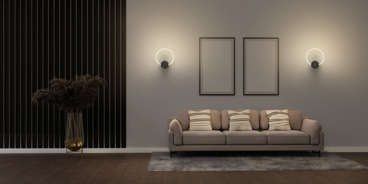 Aura Ø37 Musta seinävalaisin valmistajalta Osram - Lampan har tv&aring; olika belysningspunkter med integrerad LED, en bakom v&auml;ggplattan och cirkeln.