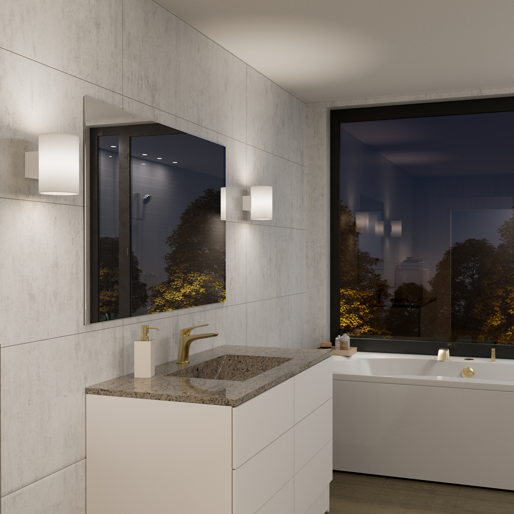 Evoke L Valkoinen seinävalaisin valmistajalta Herstal - Den smarta konstruktionen med b&aring;de upp- och nerljus g&ouml;r den till ett utm&auml;rkt val f&ouml;r att belysa din hall, vardagsrum eller sovrum p&aring; ett subtilt men effektfullt s&auml;tt.