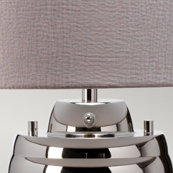 Milne 64cm Harmaa pöytävalaisin valmistajalta Elstead Lighting - Till sk&auml;rmen beh&ouml;vs en E27 ljusk&auml;lla (ej inkluderad) och till basen ing&aring;r en utbytbar 8W LED GU10-lampa, som ger 560 lumen vid en f&auml;rgtemperatur p&aring; 3000K.